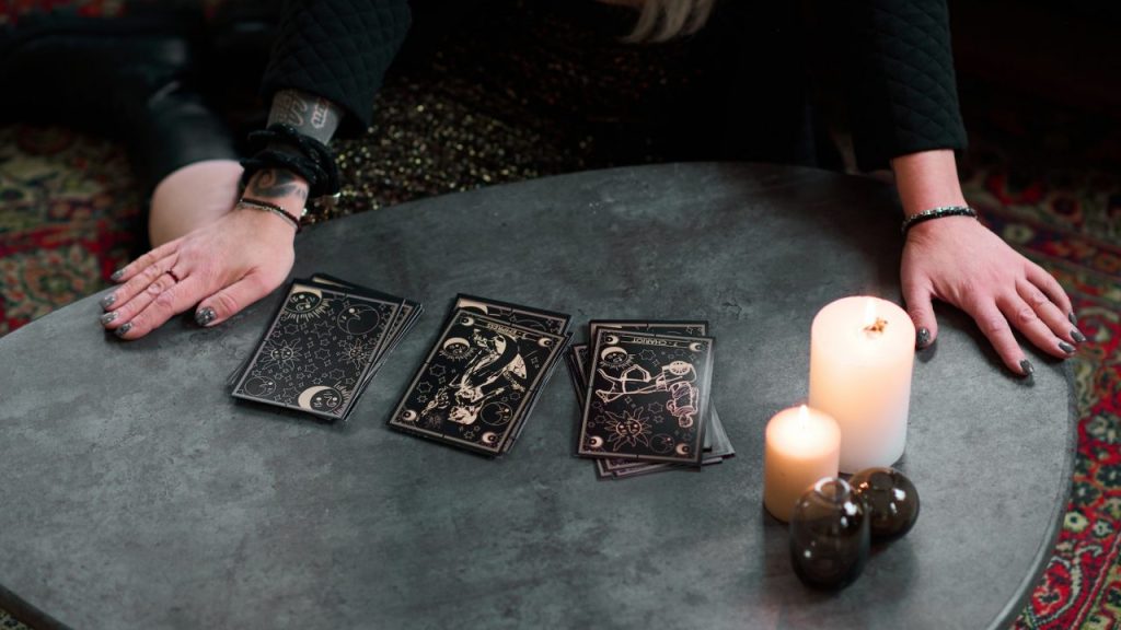 unrecognizable-woman-with-tarot-cards.jpg